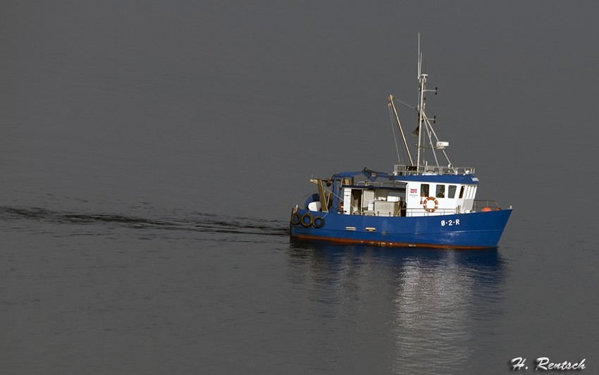 Fischerschiff in der Morgensonne